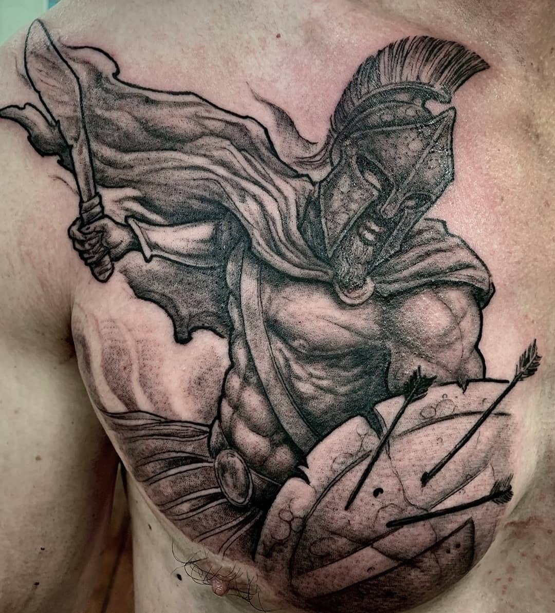 Let you true warrior shine with a Spartan tattoo like the one above.