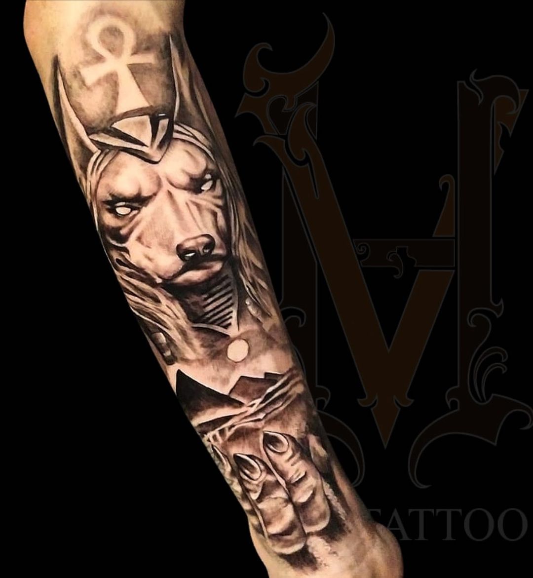 Show your love for Anubis with a half sleeve piece.