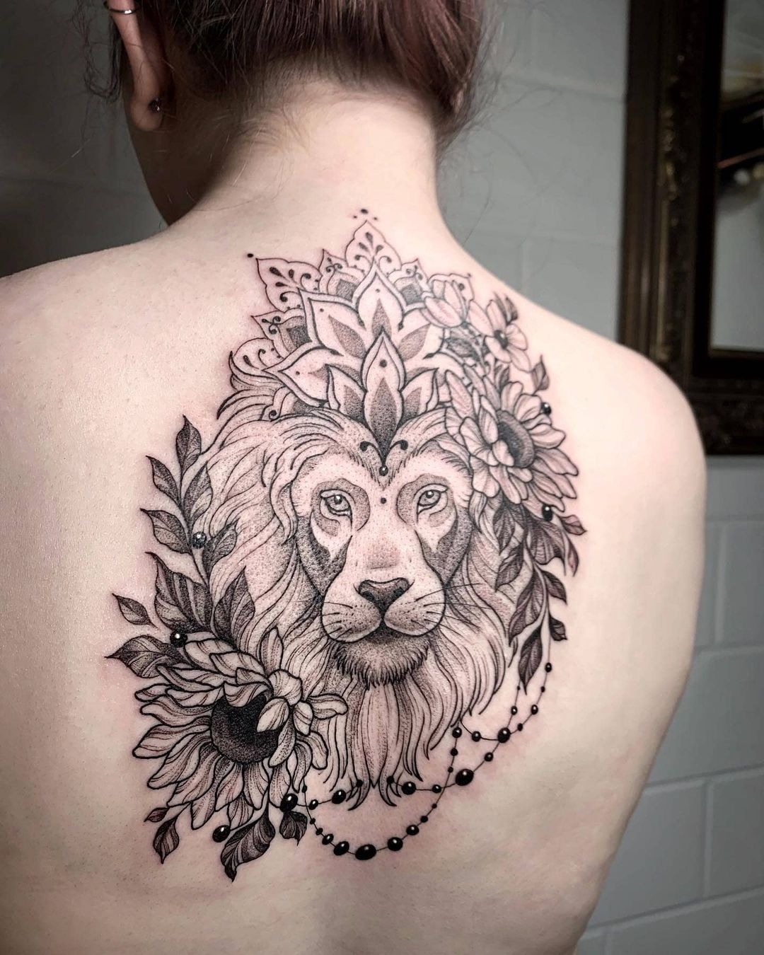 Mandalas create beautiful backdrop for your beautiful lion tattoo.