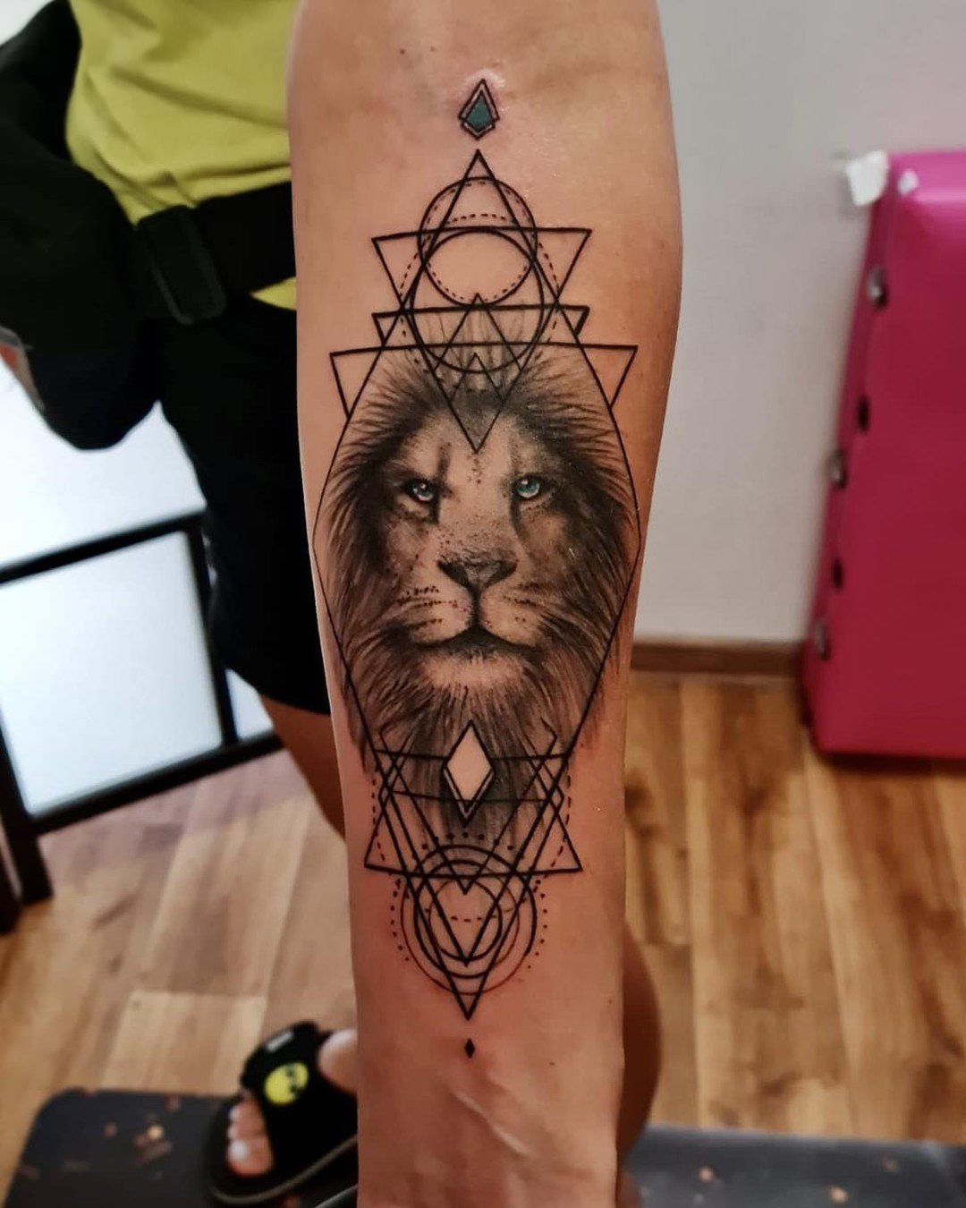 You should have a tattoo of a perfect lion in circles and triangles.
