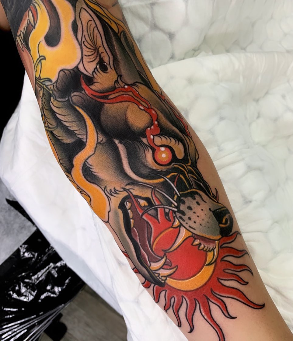 An unleashed wolf on you arm will be fantastic if you want to get a cool-looking tattoo.