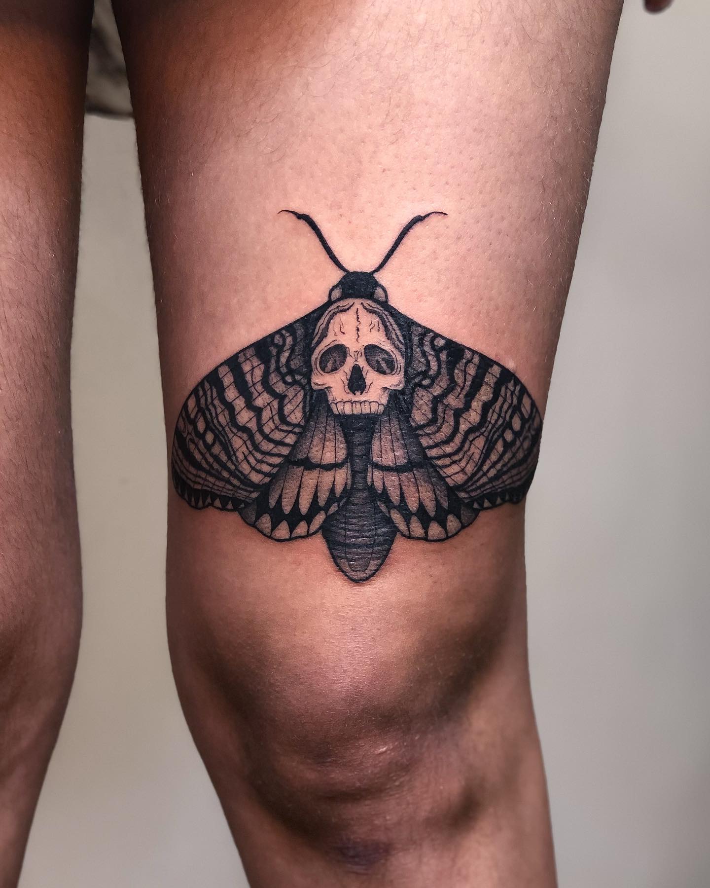 Big black and fierce, this moth tattoo shows a fierce character who is all about growth and personal persistence. It is a scary and attention-seeking design, perfect for those who like to get a ton of comments and those who like the attention for their chosen look.