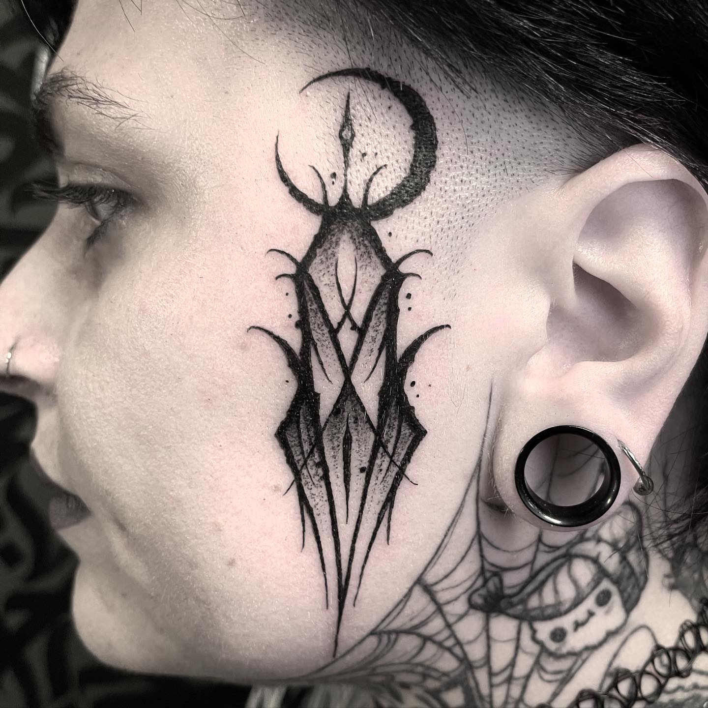 If you truly believe in dark powers, spirits, and ghosts, this will look amazing on you. Heads up since this big tattoo can be time-consuming.