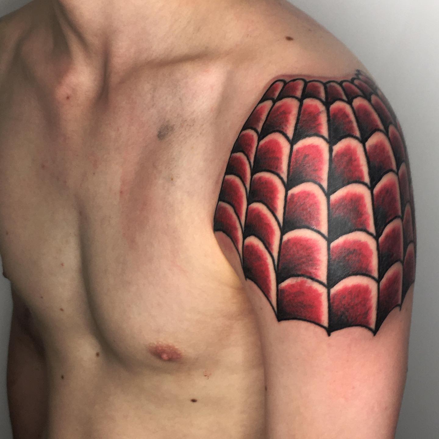 An unusual take on a spider tattoo, yet something that truly works and looks so good! If you want a pop of color to your design, give this one a go.