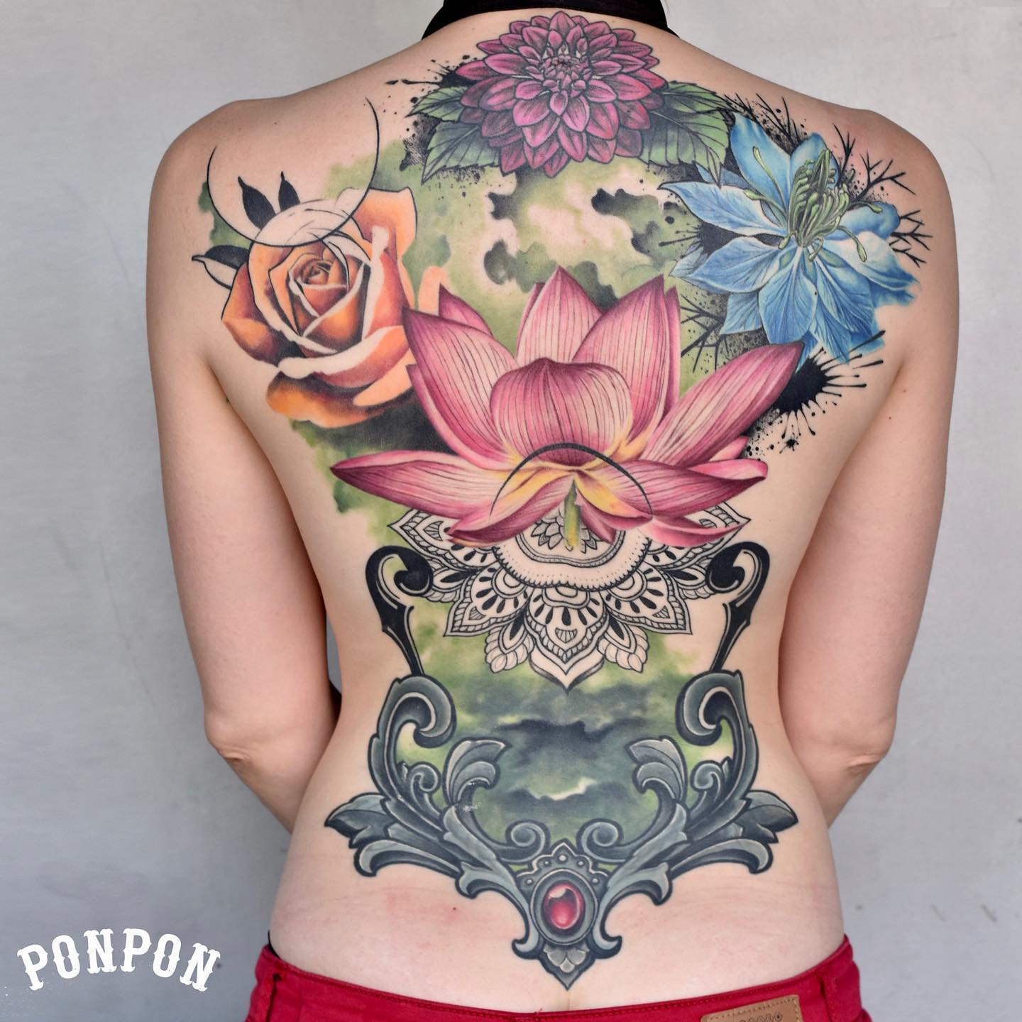 Loud flower ideas over your back can symbolize a ton of different things. Make sure that your budget is not limited when it comes to this design since it is a time-consuming yet pricey option to go for.