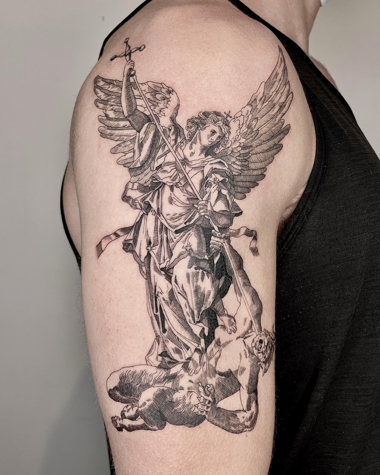 If you are a firm believer when it comes to spiritual signs or Greek mythology, why not book this black ink shoulder tattoo design?