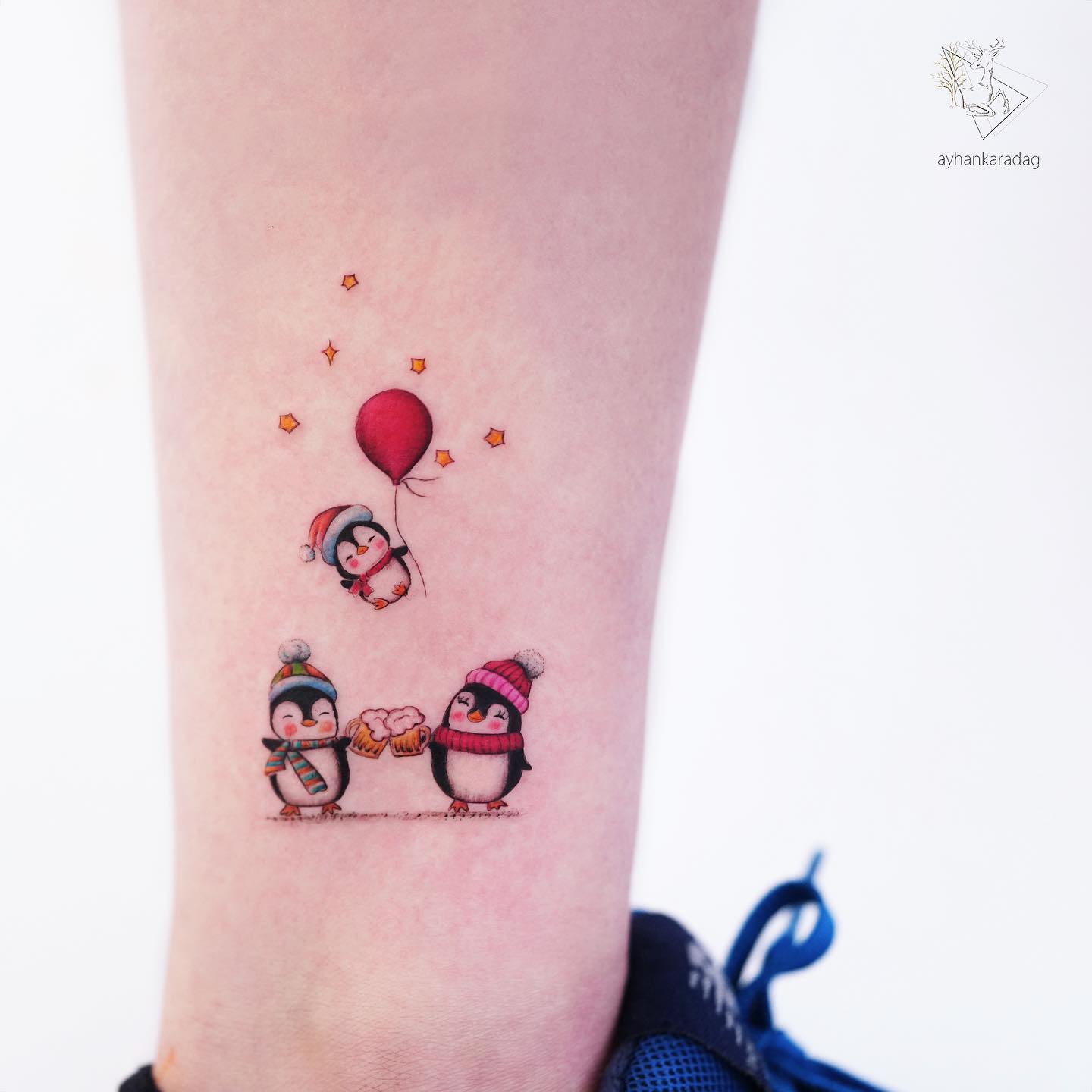 If there is something cuter than a little penguin, it is three little penguins. Every time you look at your tattoo design, it will make your heart warm.