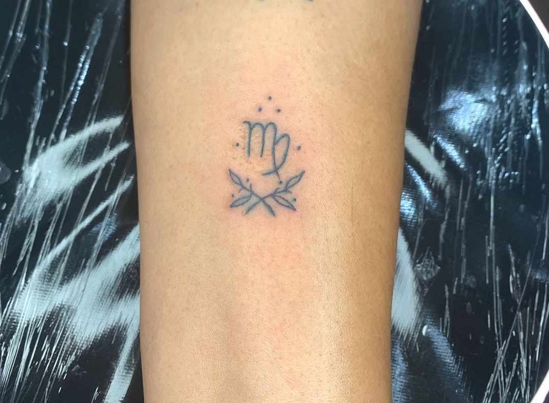 For those who prefers minimalist tattoo, this idea is for you. A tiny Virgo sign with some braches below will help you achieve a fabulous look.