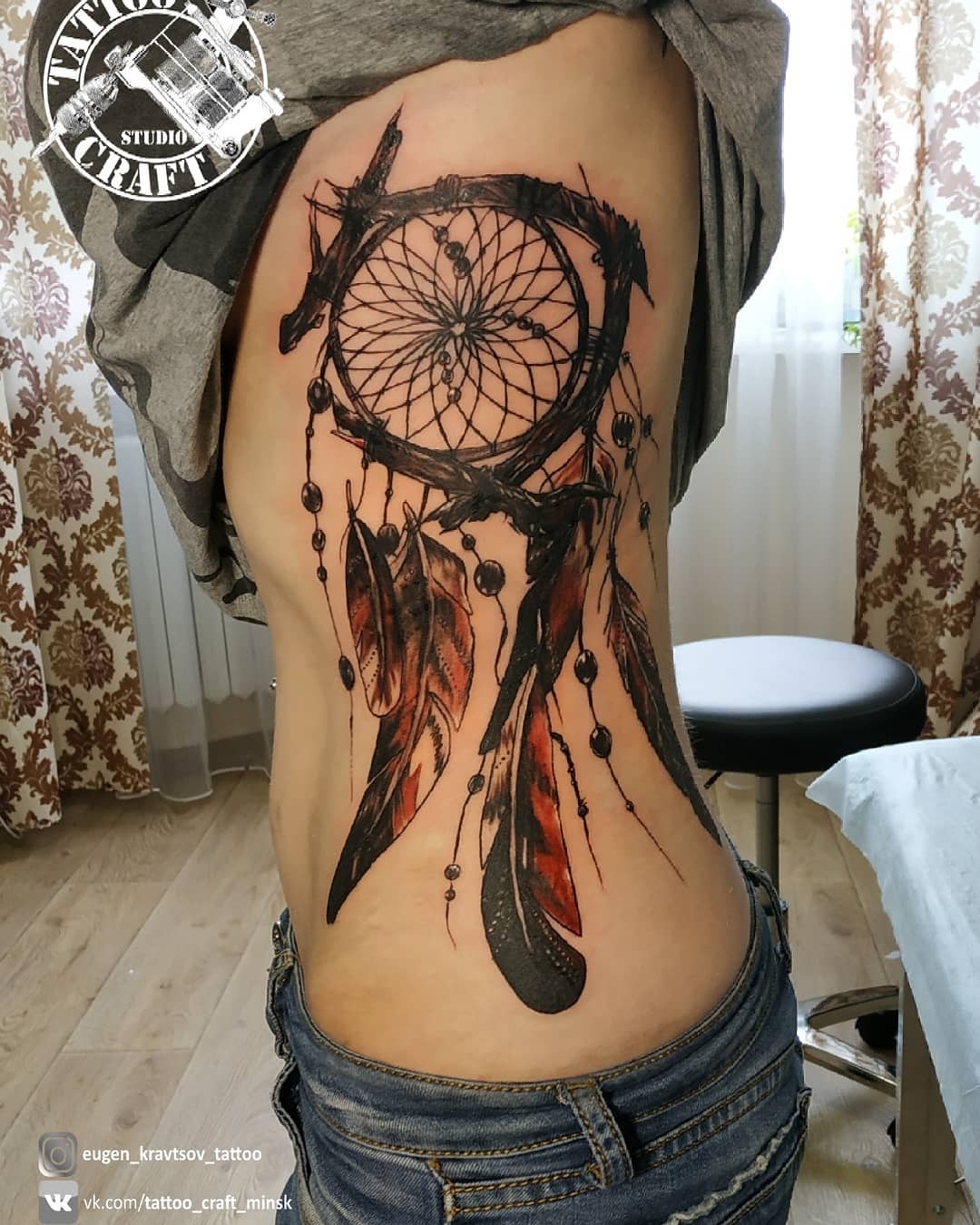 I love the idea of incorporating a dream catcher into a great tattoo. The side ribs are a great choice for the placement, because you can see them but they're not too obvious. The giant dark orange feathers give this tattoo an extra beauty!
