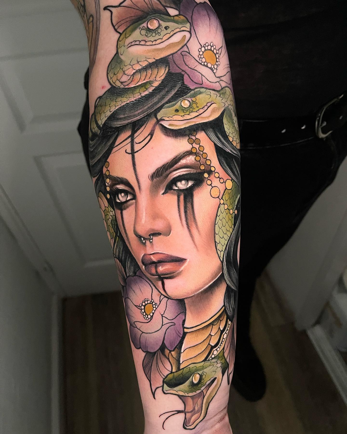 This tattoo makes you feel like if you touch it, you will feel Medusa for real. We are speechless since the artwork is extraordinary. The details under Medusa's eyes and on her lips offer an amazing look.