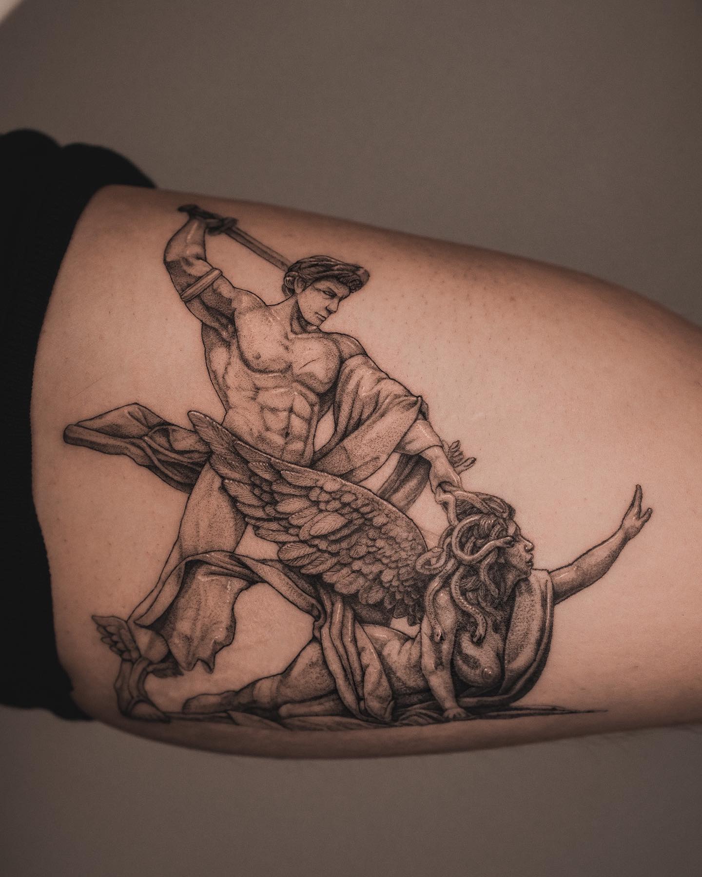 Poor Medusa is a victim of Perseus in this digital sculpture based tattoo. Although the meaning behind it can be sad since Medusa is a protector, it is not possible to ignore the skill of the tattooist.
