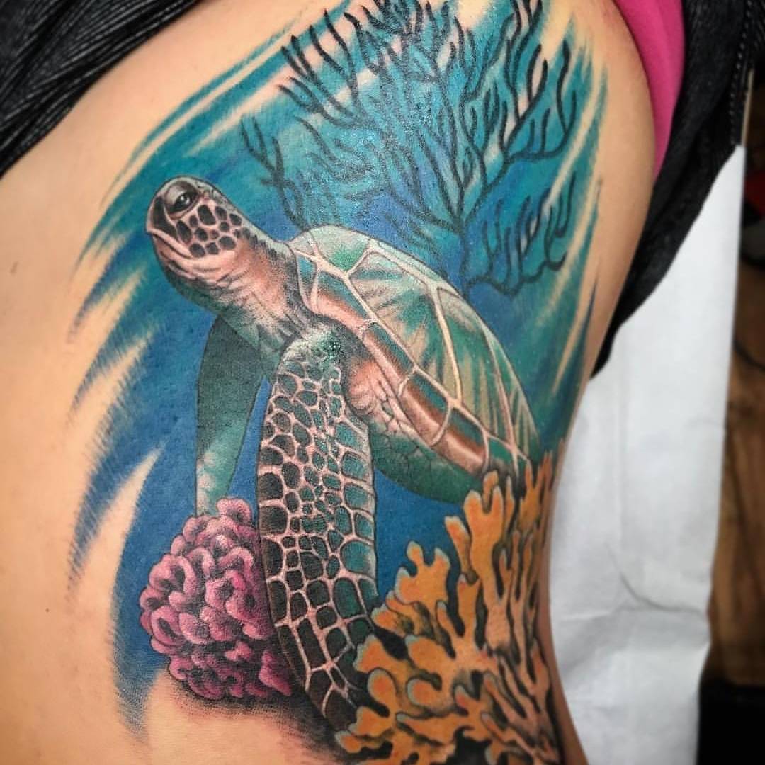 Coral is such a beautiful and important part of our oceans' ecosystems. To celebrate their connection with sea turtles and show their beauty, this tattoo is definitely for you.