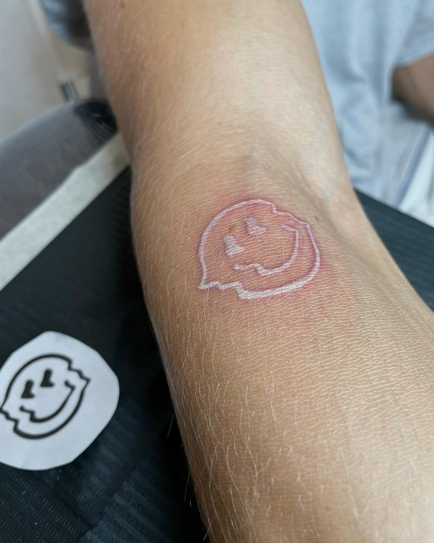 The white ink smiley face tattoo is a great way to express yourself. It's a classic symbol that everyone knows, and it's easy to draw and recognize. You can use it in any way you want, whether it's in conjunction with other tattoos or on its own.